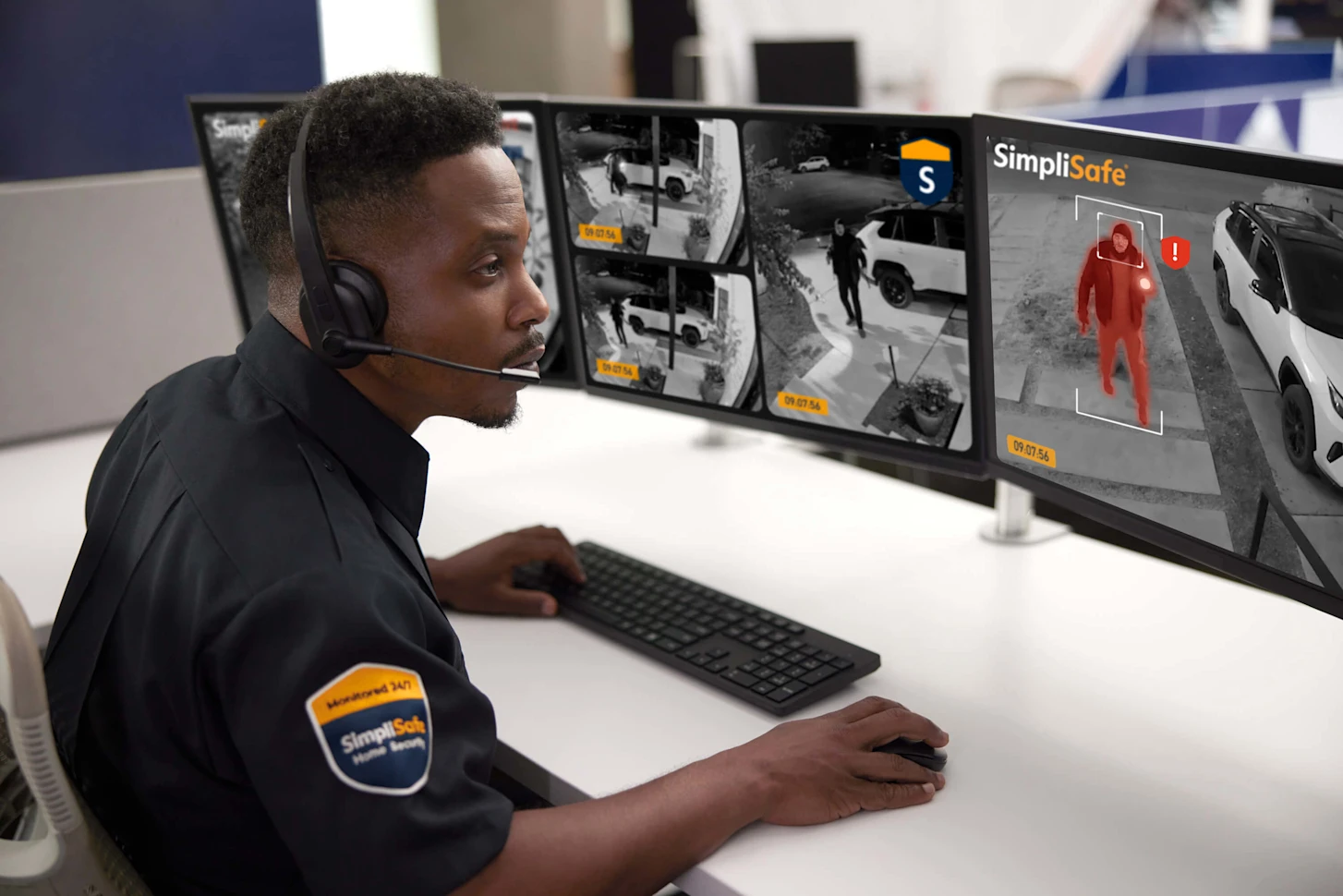 SimpliSafe monitoring professional watching security feeds
